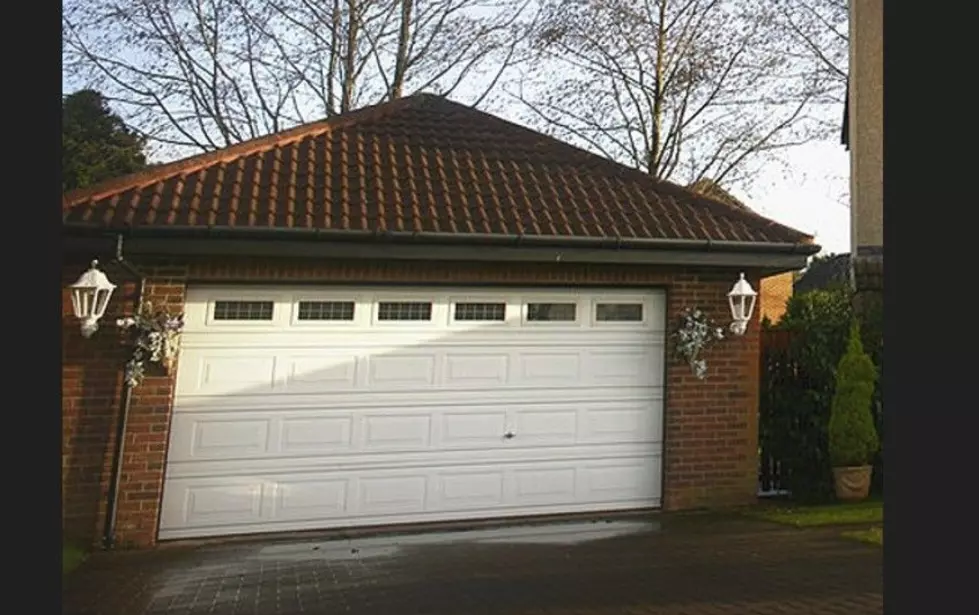 LA Architect Puts A Garage Door Inside Living Room–That’s Different!